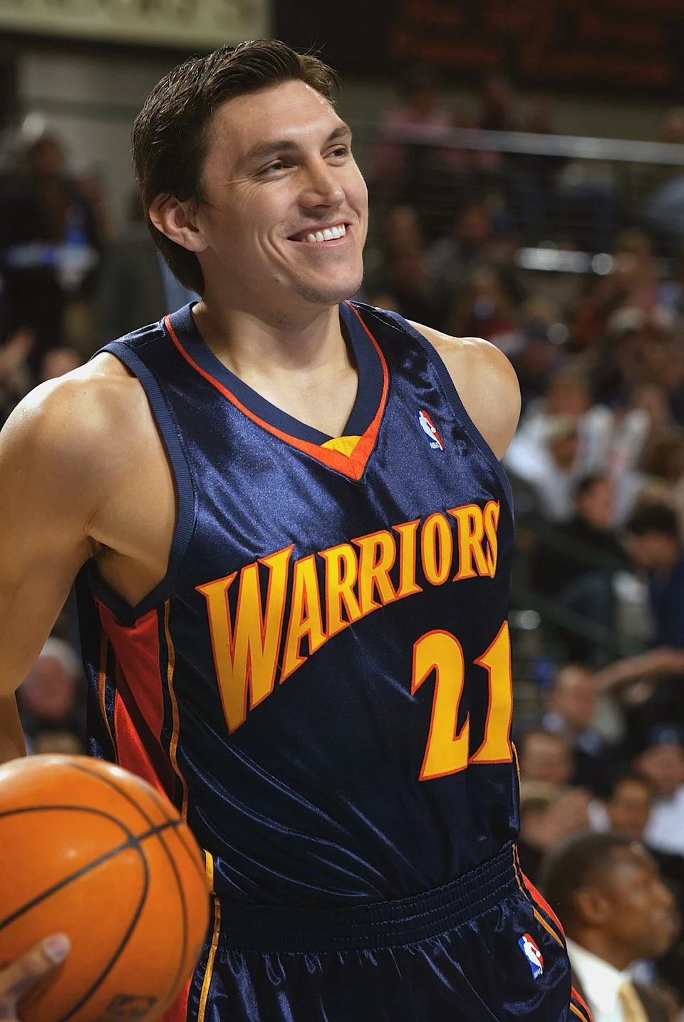 DALLAS - DECEMBER 14: Eduardo Najera #21 of the Golden State Warriors smiles during the game against the Dallas Mavericks on December 14, 2004 at the American Airlines Center in Dallas, Texas. The Warriors defeated the Mavericks 111-107. NOTE TO USER: User expressly acknowledges and agrees that, by downloading and/or using this Photograph, User is consenting to the terms and conditions of the Getty Images Licence Agreement. (Photo by Ronald Martinez/Getty Images)