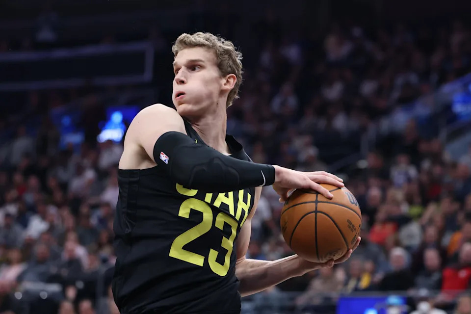 Oct 25, 2024; Salt Lake City, Utah, USA; Utah Jazz forward Lauri Markkanen (23) rebounds the ball against the Golden State Warriors during the first quarter at Delta Center. Mandatory Credit: Rob Gray-Imagn Images