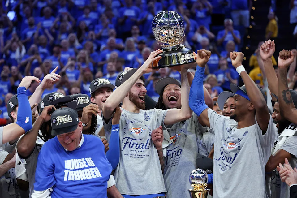OKLAHOMA CITY, OKLAHOMA - MAY 28: Chet Holmgren #7 of the Oklahoma City Thunder and teammates raise the Oscar Robertson Trophy after defeating the Minnesota Timberwolves 124-94 in Game Five of the Western Conference Finals of the 2025 NBA Playoffs at Paycom Center on May 28, 2025 in Oklahoma City, Oklahoma. NOTE TO USER: User expressly acknowledges and agrees that, by downloading and or using this photograph, User is consenting to the terms and conditions of the Getty Images License Agreement. (Photo by Matthew Stockman/Getty Images)