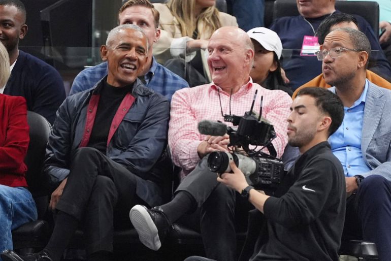 Steve Ballmer and Barack Obama react.