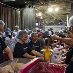 Volunteers work during the "NYC Meal Pack For 9/11 Day" at the Intrepid Museum, Wednesday, Sep. 10, 2025, in New York. AP Photo/Yuki Iwamura