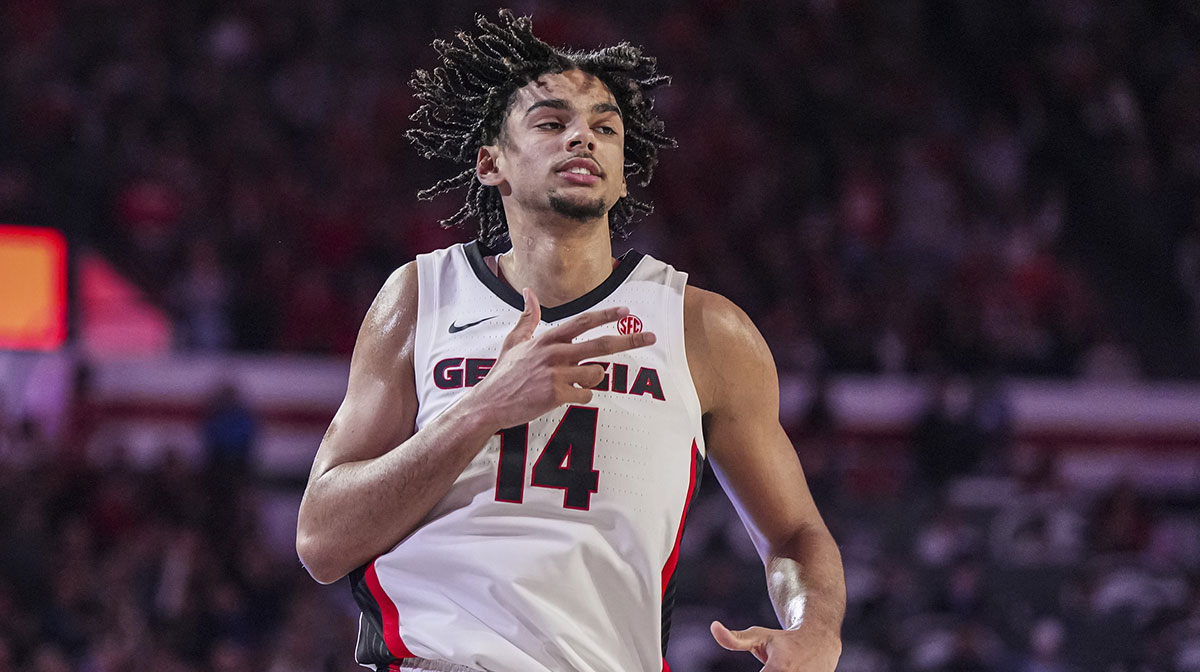 Georgia Bulldogs forward Asa Newell (14) reacts after making a three point shot against the Auburn Tigers at Stegeman Coliseum.