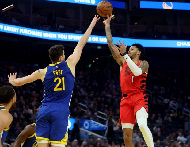 Portland Trail Blazers' Anfernee Simons #1 shoots past Golden State Warriors' Quinten Post #21 in the first quarter of their NBA game at the Chase Center in San Francisco, Calif., on Monday, March 10, 2025. (Jane Tyska/Bay Area News Group)