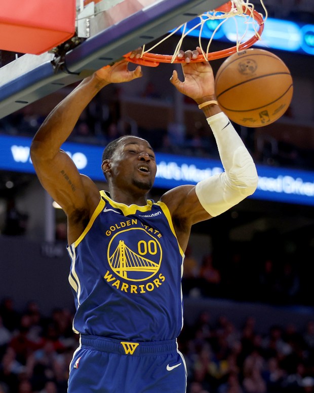 Golden State Warriors' Jonathan Kuminga #00 dunks in the fourth quarter of their NBA game against the Indiana Pacers at the Chase Center in San Francisco, Calif., on Monday, Dec. 23, 2024. (Jane Tyska/Bay Area News Group)