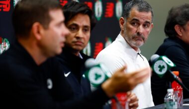 Bill Chisholm, the new lead owner and governor of the Celtics, listens to president of basketball operations Brad Stevens at Thursday's news conference.