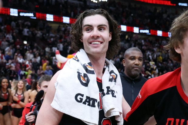 Bulls guard Josh Giddey smiles after hitting a game-winning 3-pointer as time expired against the Lakers on March 27, 2025, at the United Center. (Terrence Antonio James/Chicago Tribune)