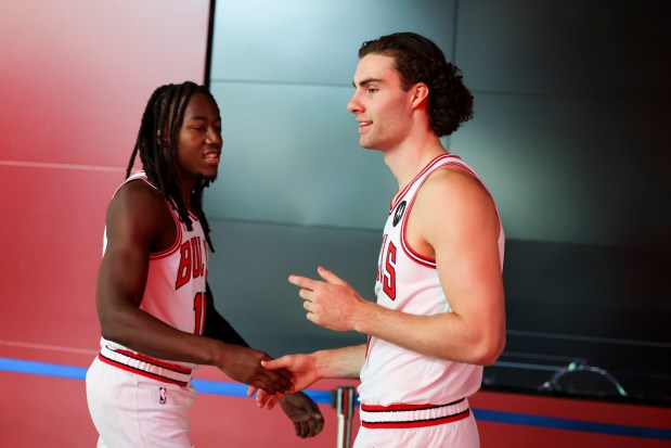 Bulls guard Ayo Dosunmu, left, greets guard Josh Giddey during media day at the United Center on Monday, Sept. 29, 2025. (Eileen T. Meslar/Chicago Tribune)