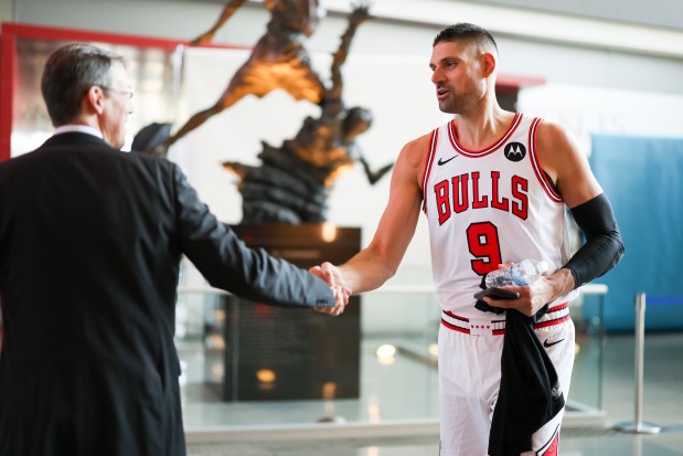 Bulls center Nikola Vucevic walks through the atrium during media day at the United Center on Monday, Sept. 29, 2025. (Eileen T. Meslar/Chicago Tribune)
