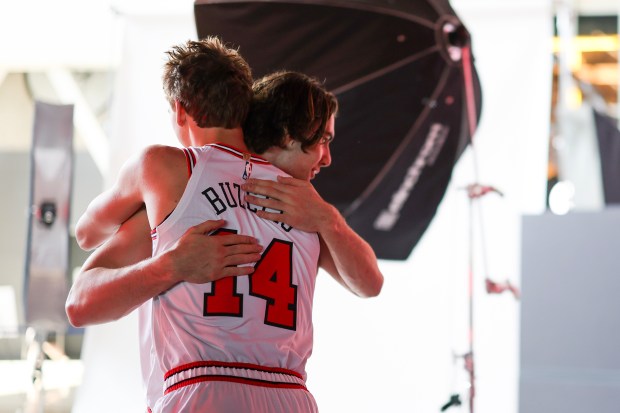 Bulls guard Josh Giddey hugs forward Matas Buzelis during media day at the United Center on Monday, Sept. 29, 2025. (Eileen T. Meslar/Chicago Tribune)