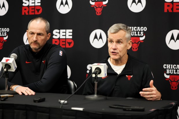 Bulls coach Billy Donovan answers questions as executive vice president of basketball operations Artūras Karnišovas sits nearby at a news conference during media day at the United Center on Monday, Sept. 29, 2025. (Eileen T. Meslar/Chicago Tribune)