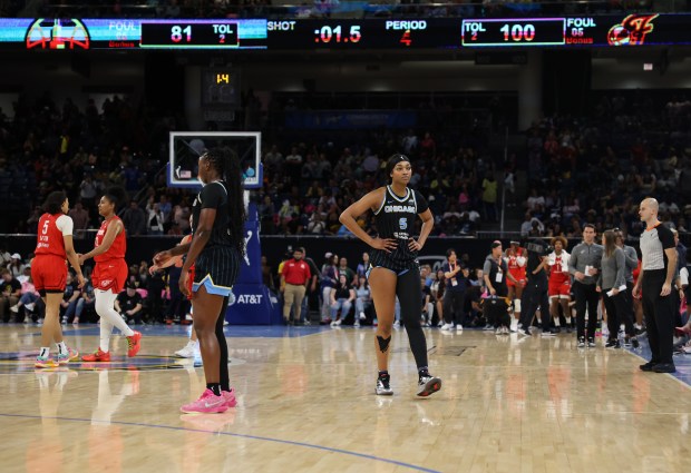 Sky forward Angel Reese walks off the floor in the...