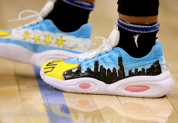 Chicago Sky forward Angel Reese (5) wears shoes featuring the...
