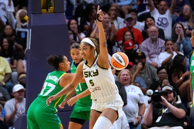 Sky forward Angel Reese (5) reacts after making a basket...