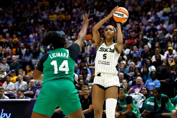 Sky's Angel Reese puts up a shot against Brazil's Licinara...