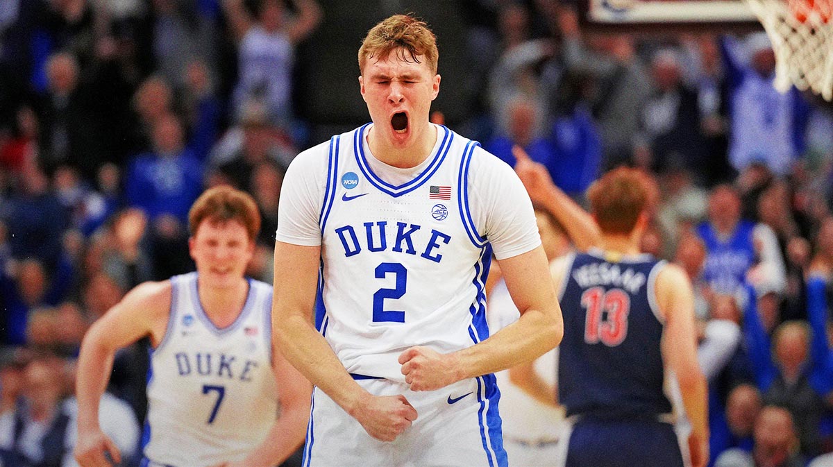 Duke Blue Devils forward Cooper Flagg (2) reacts after making a last second shot to end the first half against the Arizona Wildcats during an East Regional semifinal of the 2025 NCAA tournament at Prudential Center.