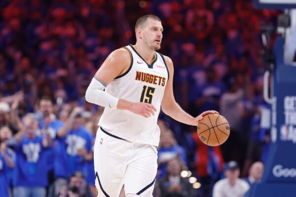 Denver Nuggets center Nikola Jokic (15) dribbles down the court against the Oklahoma City Thunder in the second quarter during game seven of the second round for the 2025 NBA Playoffs at Paycom Center.