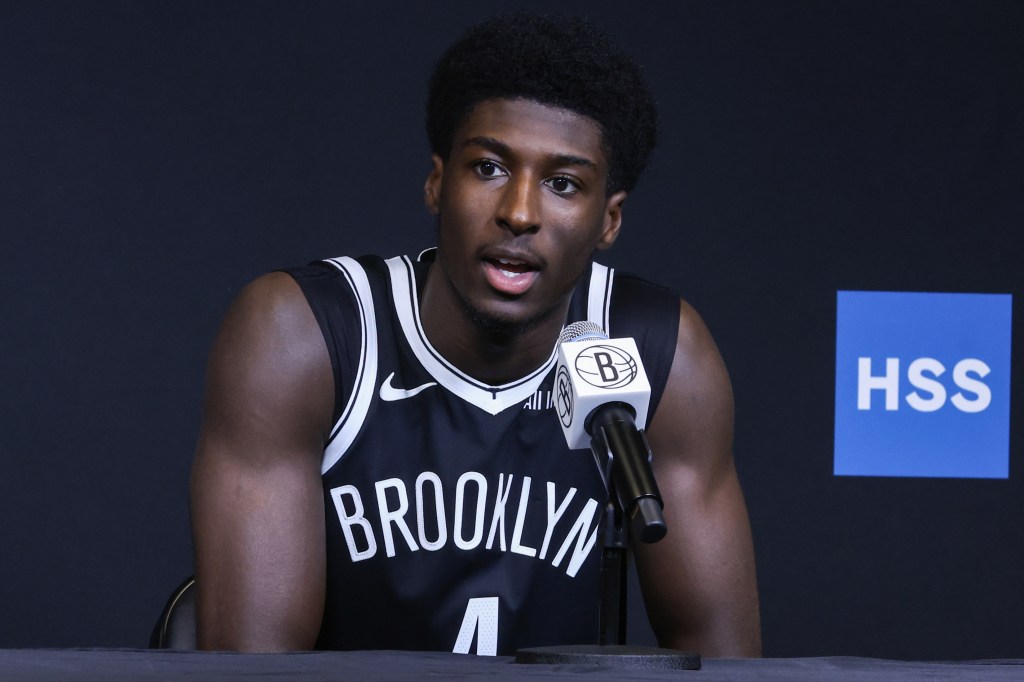 Drake Powell talks with reporters on Sept. 23, 2025, the day before the start of Nets' training camp.