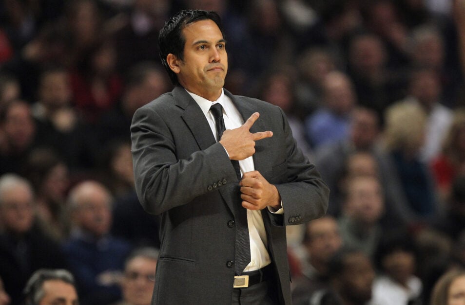 Head coach Erik Spoelstra of the Miami Heat reacts to a call as he leads the Heat against the Chicago Bulls at the United Center.