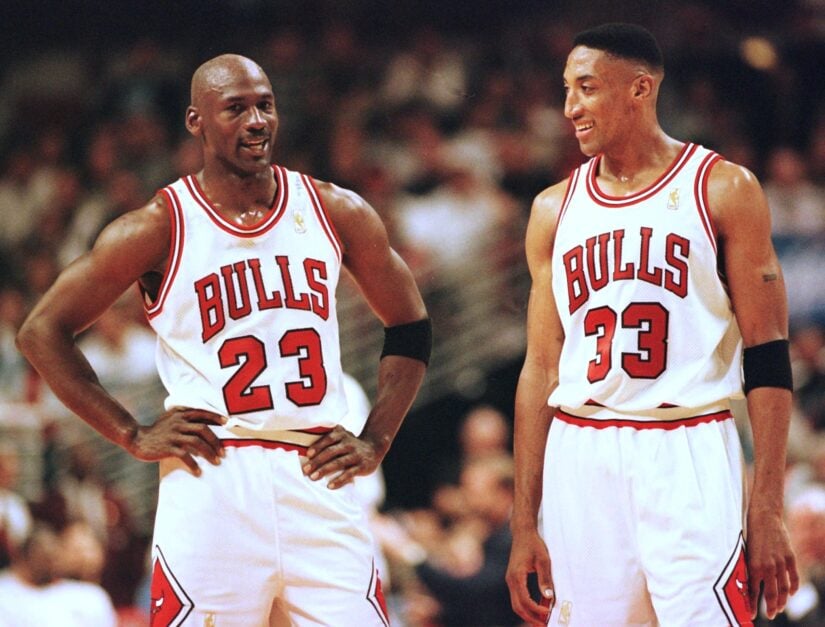 Michael Jordan (L) and Scottie Pippen (R) of the Chicago Bulls talk during the final minutes of their game 22 May in the NBA Eastern Conference finals aainst the Miami Heat at the United Center in Chicago, Illinois. The Bulls won the game 75-68 to lead the series 2-0.