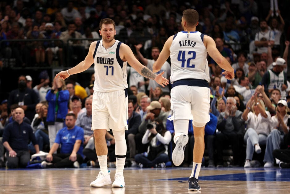 Luka Doncic #77 and Maxi Kleber #42 of the Dallas Mavericks celebrate a basket