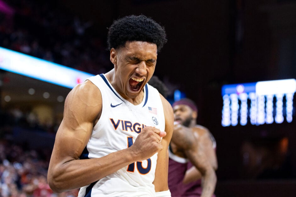 Ryan Dunn #13 of the Virginia Cavaliers celebrates a dunk in the second half during a game against the Texas.