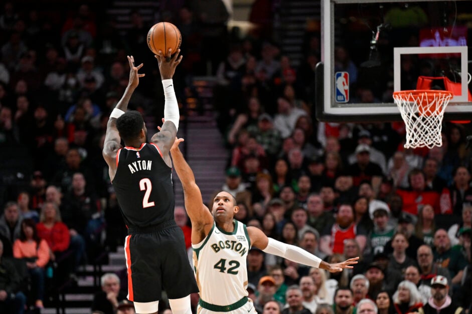 Deandre Ayton #2 of the Portland Trail Blazers shoots over Al Horford #42 of the Boston Celtics during the first quarter at the Moda Center on March 11, 2024 in Portland, Oregon.