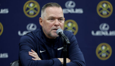 DENVER, COLORADO - SEPTEMBER 26: Head coach Michael Malone of the Denver Nuggets fields questions d...