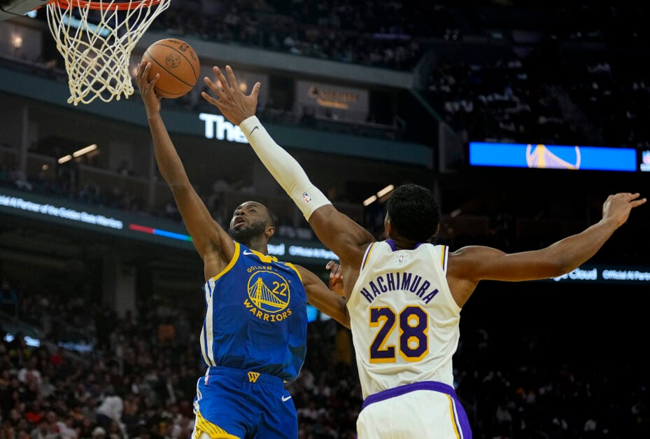 Andrew Wiggins #22 of the Golden State Warriors shoots over Rui Hachimura #28 of the Los Angeles Lakers