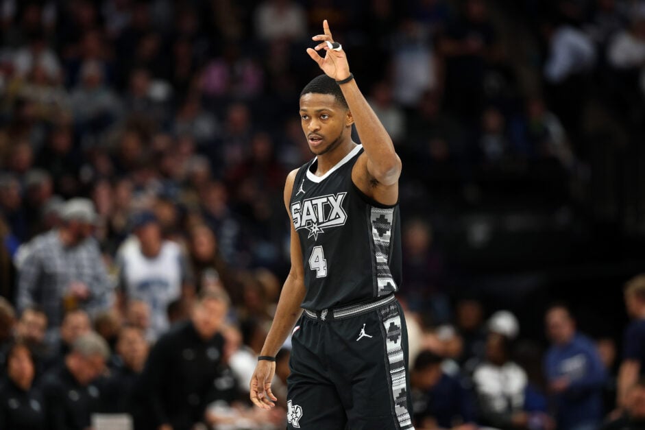 De'Aaron Fox #4 of the San Antonio Spurs gestures against the Minnesota Timberwolves in the third quarter.