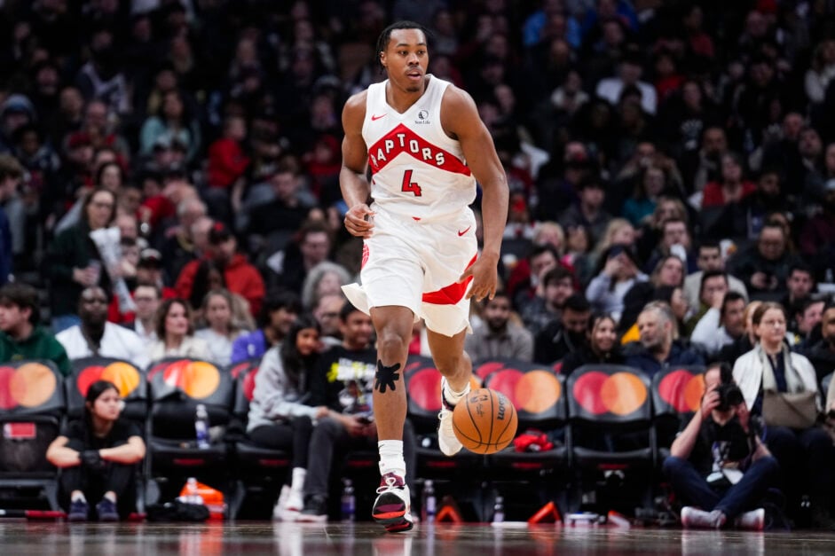 Scottie Barnes #4 of the Toronto Raptors dribbles against the Washington Wizards during the second half of their basketball game at the Scotiabank Arena on March 10, 2025 in Toronto, Ontario, Canada.