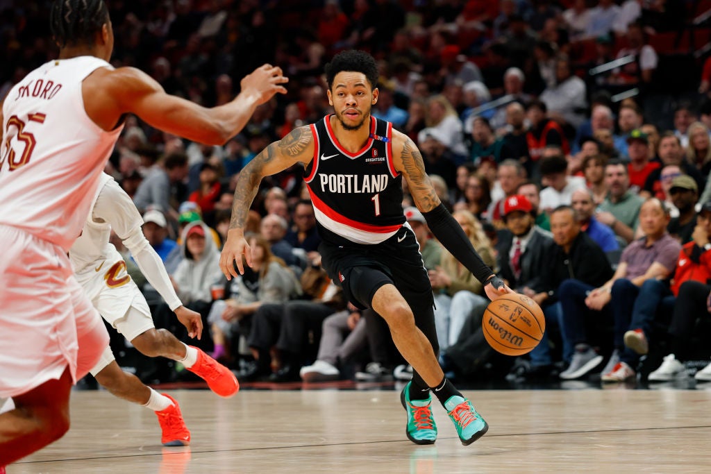 Anfernee Simons #1 of the Portland Trail Blazers dribbles against the Cleveland Cavaliers.