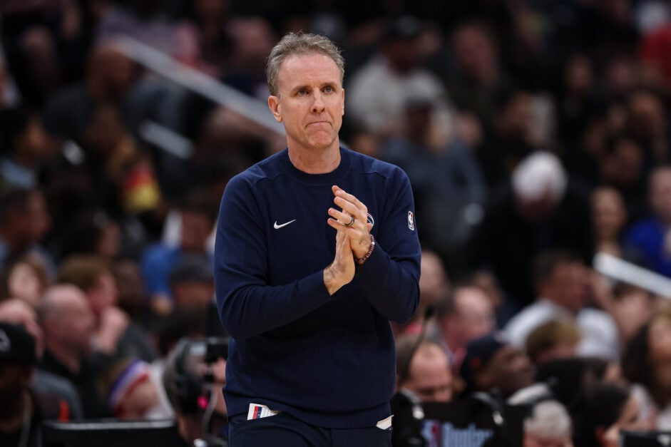 Head coach Brian Keefe of the Washington Wizards reacts to a play against the Brooklyn Nets during the second half at Capital One Arena.