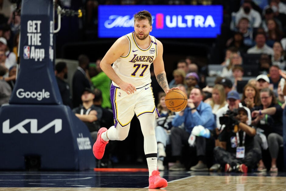 Luka Doncic #77 of the Los Angeles Lakers dribbles the ball against the Minnesota Timberwolves.