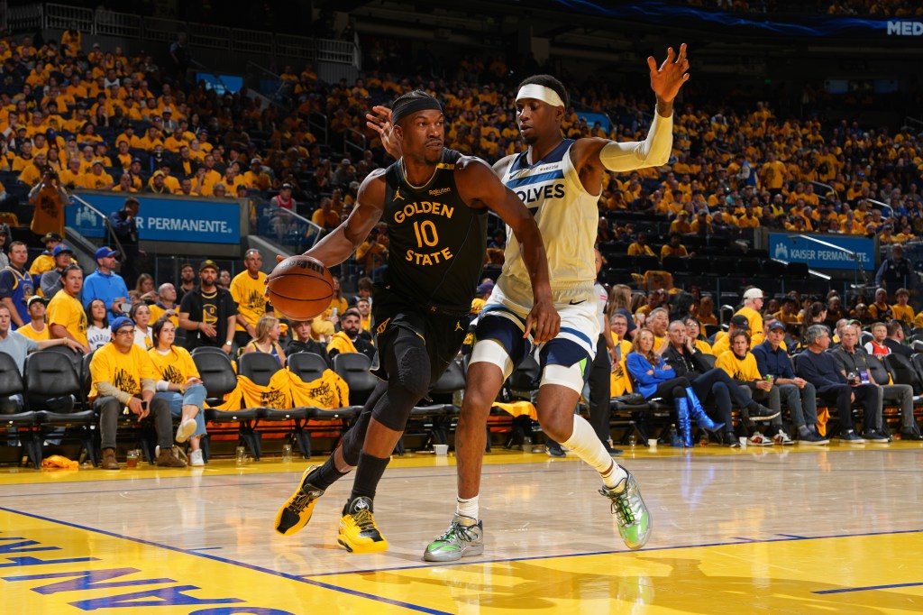 Jimmy Butler (10) of the Warriors dribbles against the Timberwolves during Game 4 of the second round on May 12, 2025.