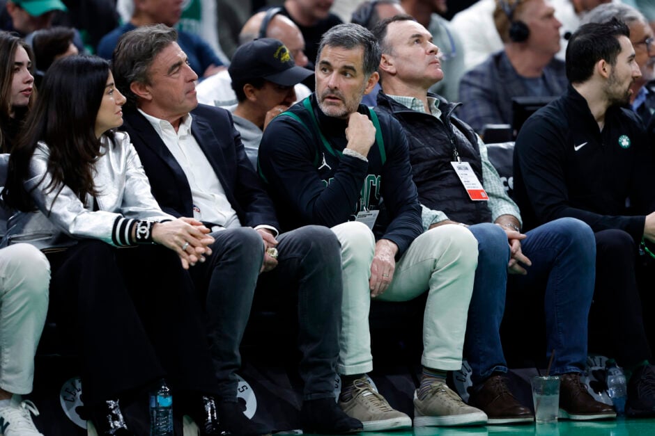 New Boston Celtics owner William Chisholm watching a game courtside alongside former Celtics owner Wyc Grousbeck.