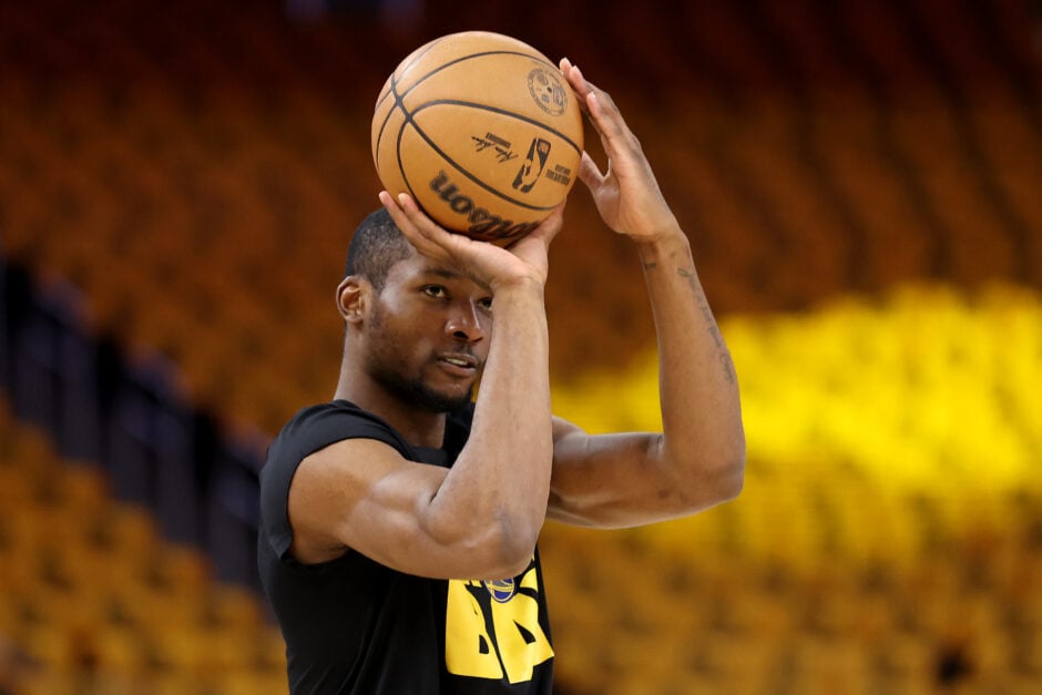 Jonathan Kuminga #00 of the Golden State Warriors warms up before the game against the Minnesota Timberwolves.