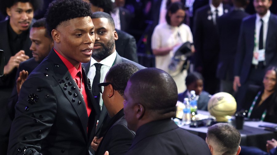 Ace Bailey celebrates with family after being drafted fifth overall by the Utah Jazz