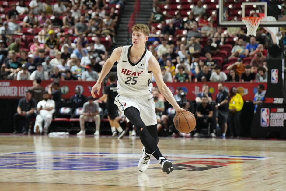Kasparas Jakucionis #25 of the Miami Heat dribbles the ball