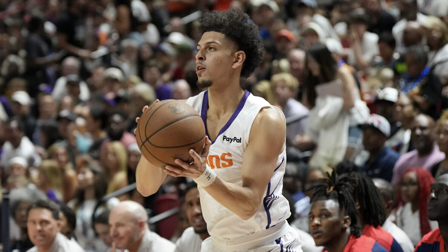 Koby Brea #14 of the Phoenix Suns prepares to shoot against the Washington Wizards in the first hal...