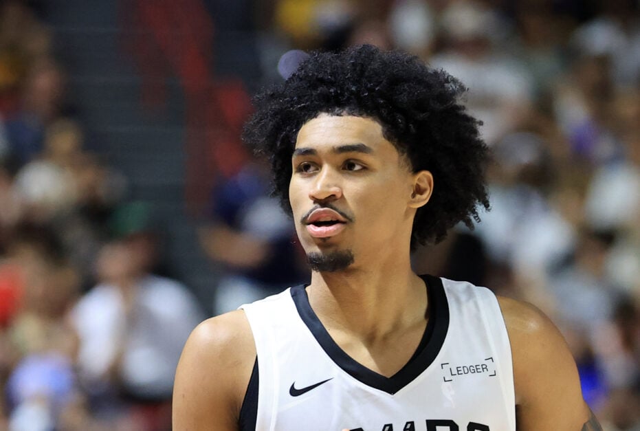 Dylan Harper #2 of the San Antonio Spurs walks on the court during a break in the first half of a 2025 NBA Summer League game against the Dallas Mavericks.