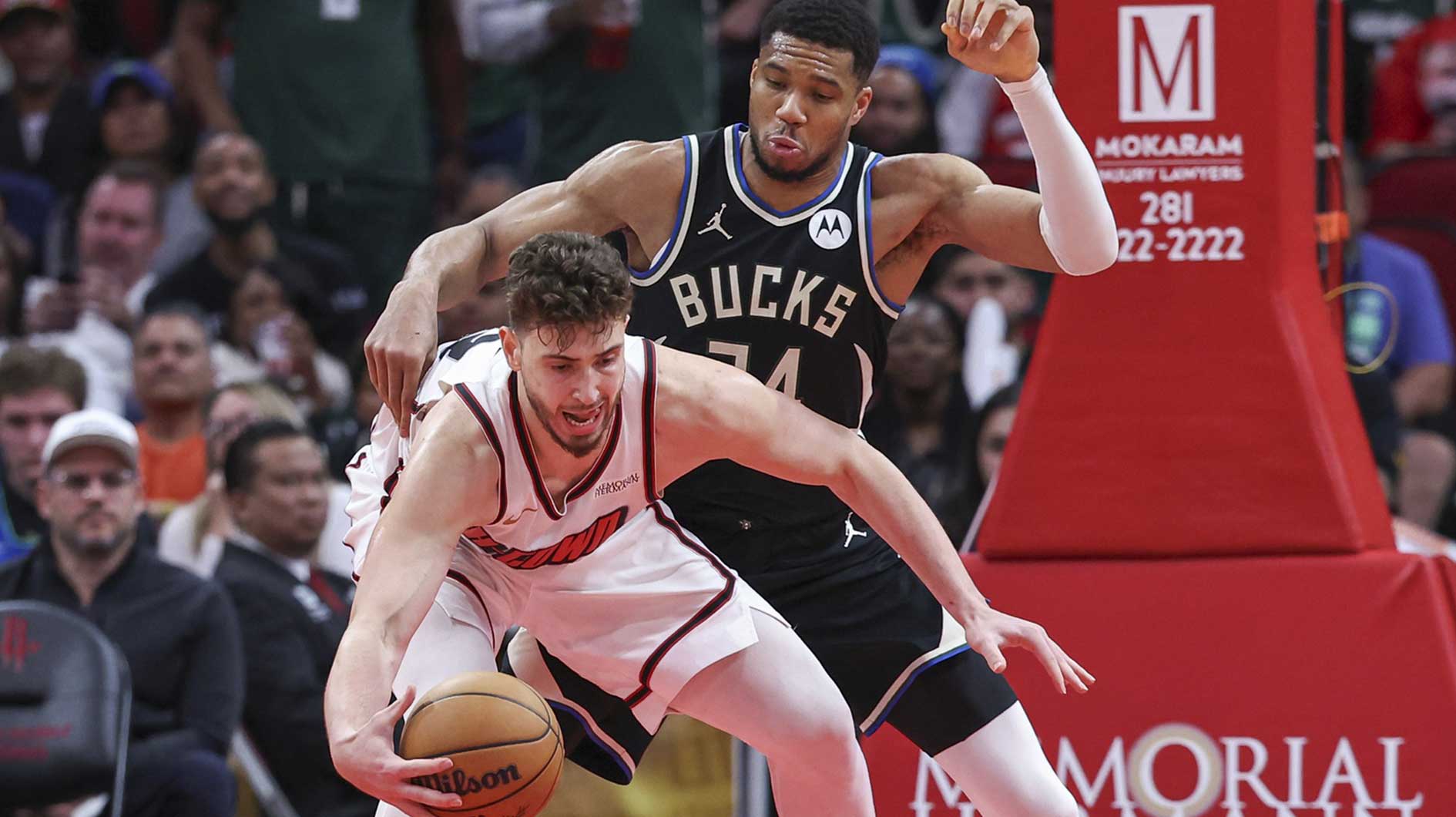 Milwaukee Bucks forward Giannis Antetokounmpo (34) defends against Houston Rockets center Alperen Sengun (28) during the fourth quarter at Toyota Center.