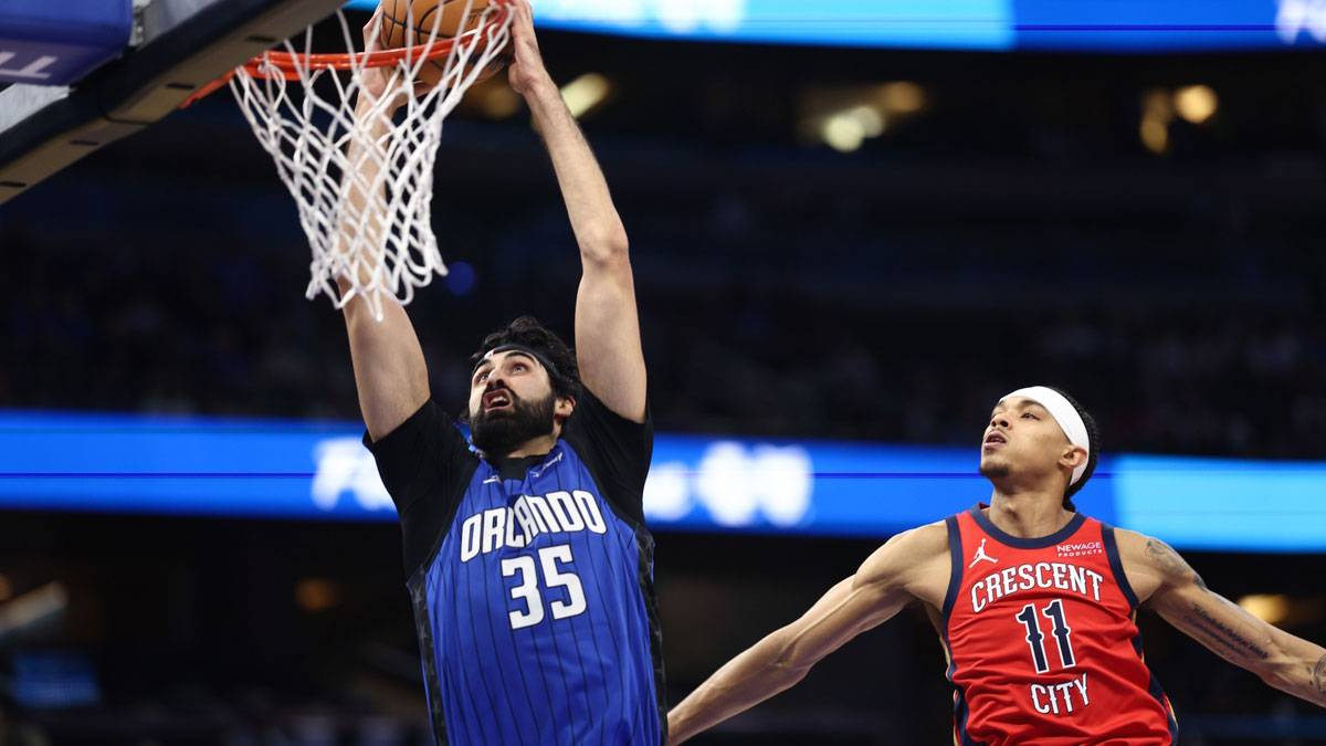 Orlando Magic center Goga Bitadze (35) dunks the ball over New Orleans Pelicans guard Brandon Boston Jr. (11) in the first quarter at Kia Center.