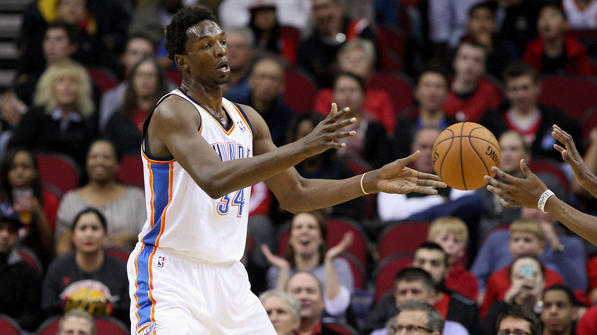 Oklahoma City Thunder center Hasheem Thabeet (34) passes the ball during the fourth quarter against the Houston Rockets at Toyota Center. The Rockets defeated the Thunder 122-119.