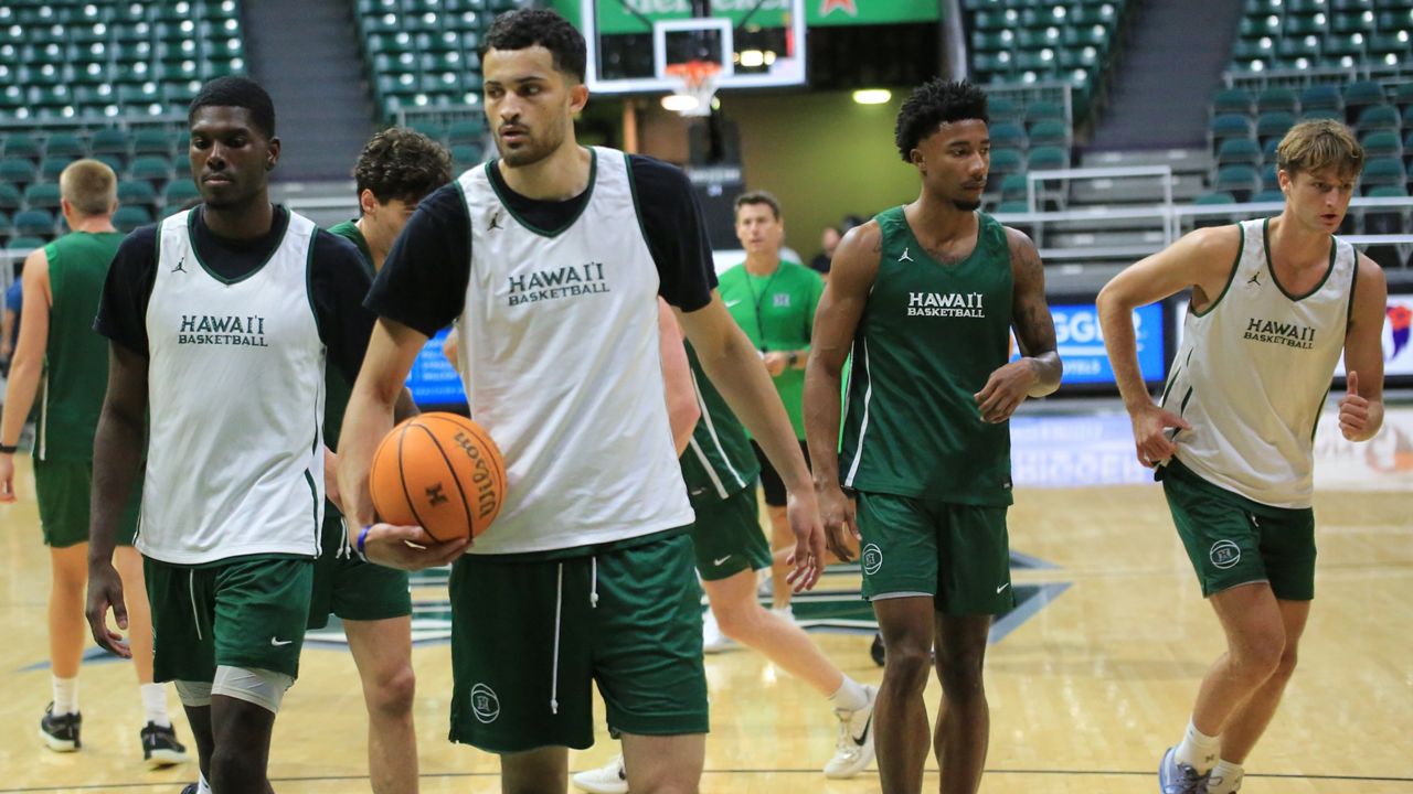 Four of the new faces of the Hawaii men's basketball team, from left, Jalen Myers, Yacine Toumi, Dre Bullock and Isaac Finlinson at the Rainbow Warriors' first official practice of the 2025-26 preseason in the Stan Sheriff Center on Tuesday.