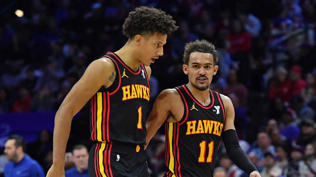 Hawks forward Jalen Johnson (1) and guard Trae Young (11) against the Philadelphia 76ers during the fourth quarter at Wells Fargo Center