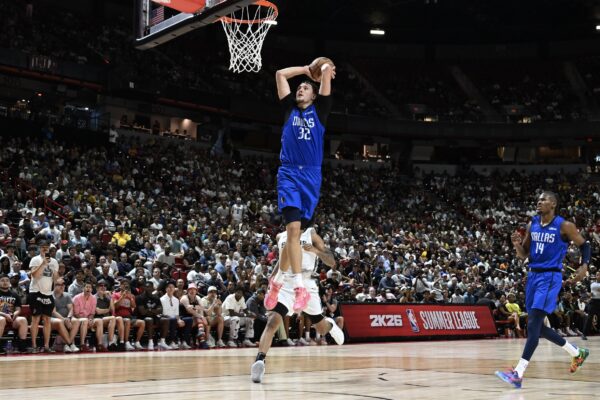 Dallas Mavericks forward Cooper Flagg (32) dunks against the San Antonio Spurs in the fourth quarter of their game at Thomas & Mack Center.