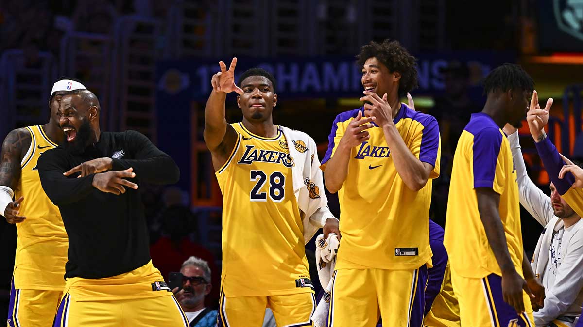 Lakers forward Jarred Vanderbilt (2), forward LeBron James (23), forward Rui Hachimura (28), center Jaxson Hayes (11), and Los Angeles Lakers guard Luka Doncic (77) celebrate after scoring against the Houston Rockets during the second half at Crypto.com Arena