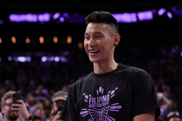 Former NBA player Jeremy Lin on the court after the game between the Washington Mystics and Golden State Valkyries during the fourth quarter at Chase Center.