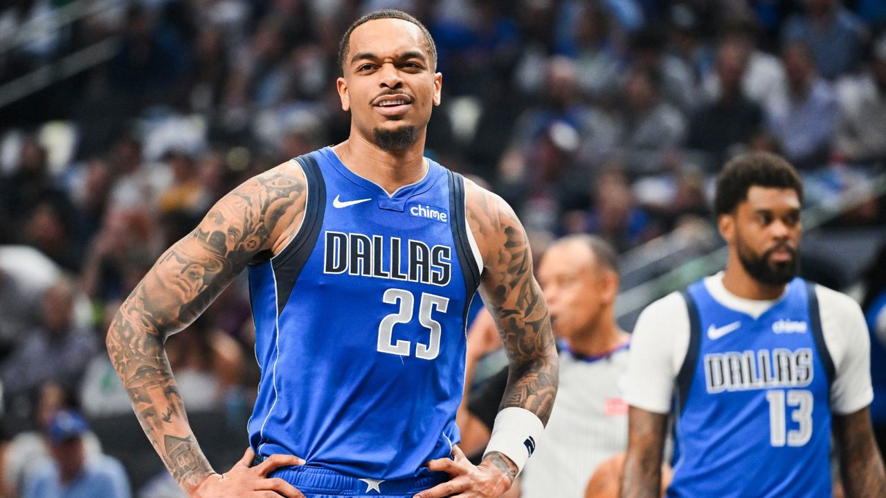 Dallas Mavericks forward P.J. Washington reacts during an NBA basketball game against the Brooklyn Nets, Monday, March 31, 2025, in Dallas, Texas. (AP Photo/Albert Pena, File)