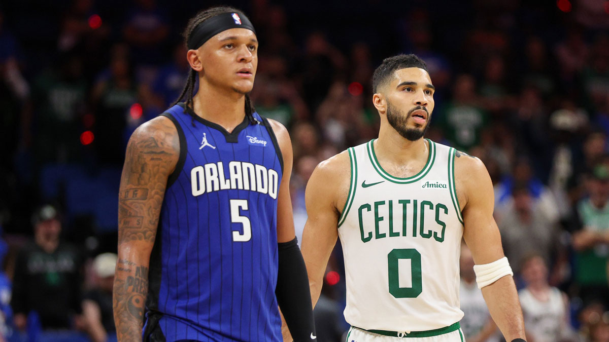 Orlando Magic forward Paolo Banchero (5) and Boston Celtics forward Jayson Tatum (0) wait fro a break in play in the fourth quarter during game four of first round for the 2025 NBA Playoffs at Kia Center.